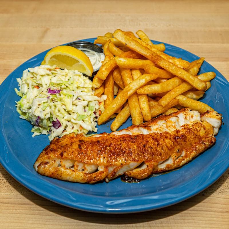Fresh catch served with fries at Jack's Seafood Bar & Grill